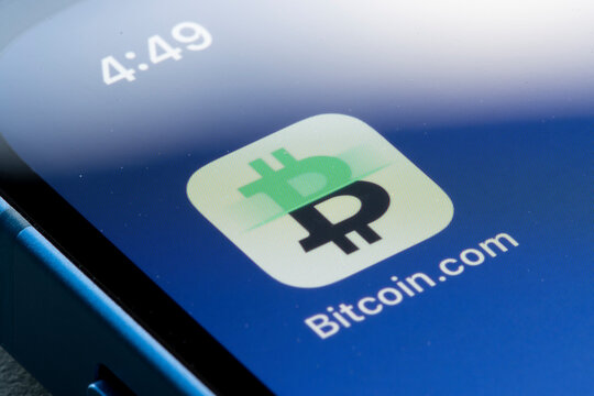 Portland, OR, USA - Feb 17, 2022: Closeup of the Bitcoin.com Wallet app icon seen on an iPhone. The multicoin crypto wallet app lets users buy, sell, store, trade, and use cryptocurrency.