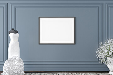 Gorizontal frame on a gray wall in the interior