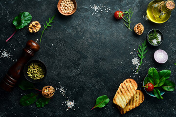 Obraz na płótnie Canvas Cooking banner. Background with spices and vegetables. Top view. Free space for your text.