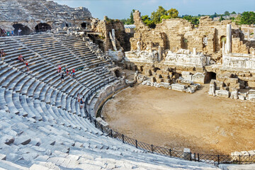 Well-preserved ancient theater in Side, ruined ancient city (Turkey, Antalya region). The largest Roman theater in Turkey. Panoramic view, wide shot. History, art or architecture concept © Elena