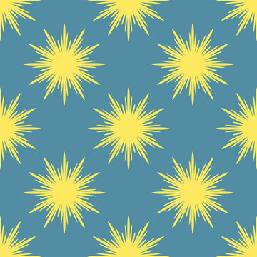 Seamless pattern with yellow abstract flowers on a blue background for packaging, fabrics, backgrounds and other products.