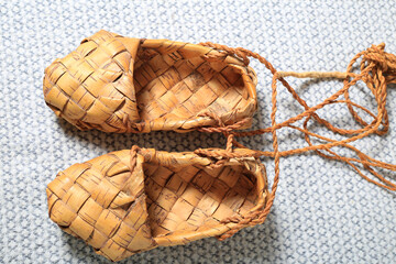 russian bast shoes on canvas close-up