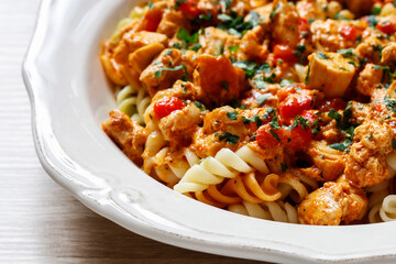 Pasta with beef and vegetables in a large saucepan.