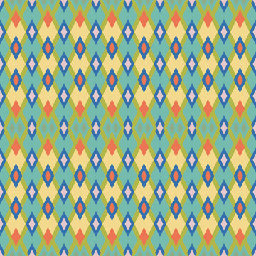 Seamless vector pattern. Abstract geometric colorful background of rhombuses. For use on wallpaper, fabric, packaging and more.