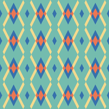 Seamless vector pattern. Abstract geometric colorful background of rhombuses. For use on wallpaper, fabric, packaging and more.