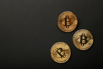 Bitcoin coin on black background. Bitcoin growthand investment concept.