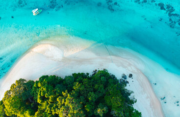 Beautiful top view of  the lagoon sand beach tropical with seashore as the island in a coral reef...