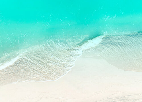 The turquoise wave water background of summer beach at the seashore sand beach -Summer pattern image
