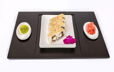 Sushi rolls Japanese delicacies. Japanese traditional rice and fish dishes. Beautiful serving food on a light background with copy space. A set of delicious goodies.