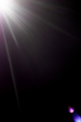 bright rays of light on a dark background. soft focus