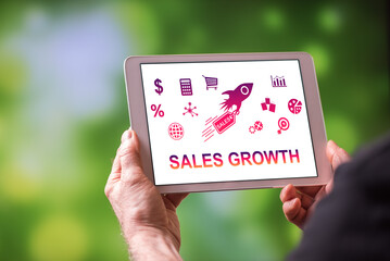 Sales growth concept on a tablet
