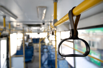 People Hand holding Handle on the train .Clipping path