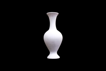 white gypsum vase isolated on a black background