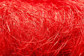 Texture of red fibers, closeup view