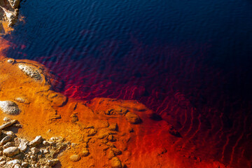 The 'Rio Tinto' river, in Huelva, Spain, whose waters dye the rocks of its bed in bright colors due to the minerals from the mines