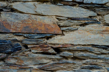 Stone and clay wall texture. Natural stone background.
