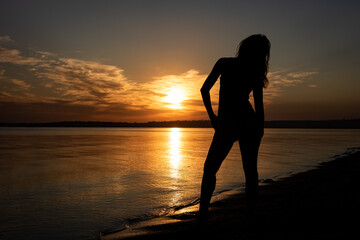 
Woman silhouette at sunset