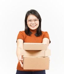 Holding Package Box or Cardboard Box and Give it To You Of Beautiful Asian Woman Isolated On White Background