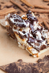 a multi-layered cake made of chocolate and cream cakes