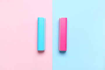 Power banks on pink and blue background