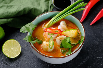 Asian fish soup on a black background