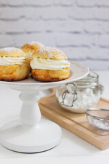 Fastelavn carnival buns sweet powder traditional nordic food.