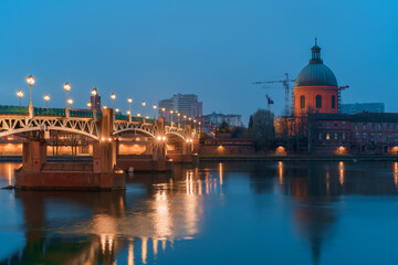 Garonne river and Dome of the 'Hopital de la Grave' at dusk in Toulouse, France