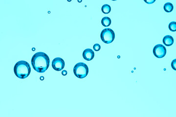 Clear water with air bubbles on blue background