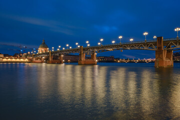 Garonne river and Dome of the 'Hopital de la Grave' at dusk in Toulouse, France