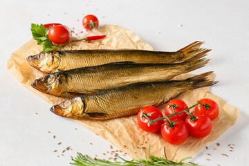Smoked herring fishes on white background