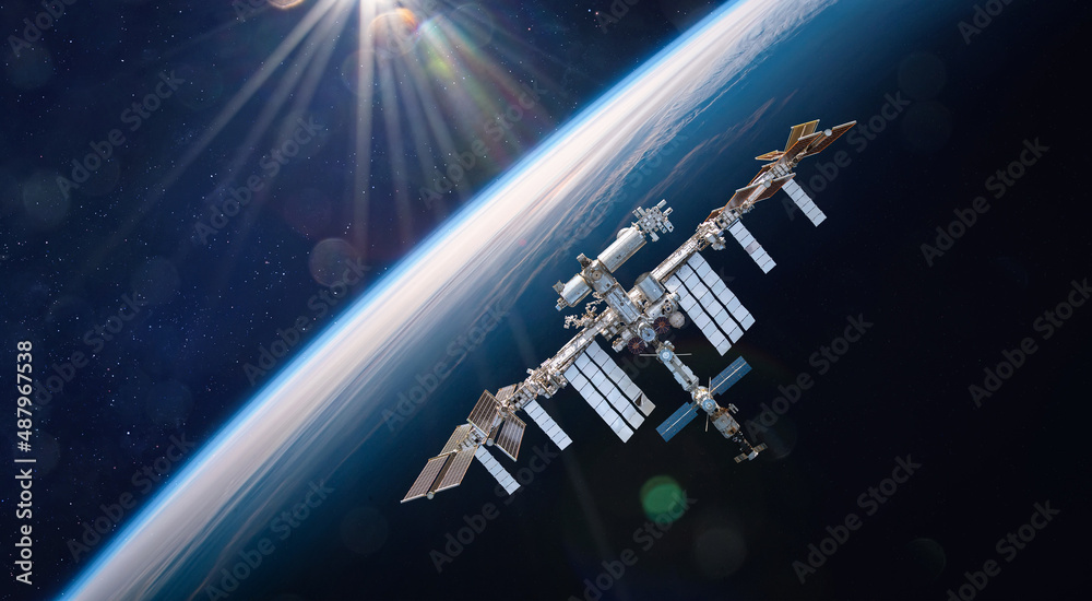 Leinwandbilder international space station on orbit of earth. space collage with iss and planet surface. astronauts