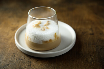 Homemade coffee drink with milk foam