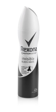 Bottle of deodorant on white