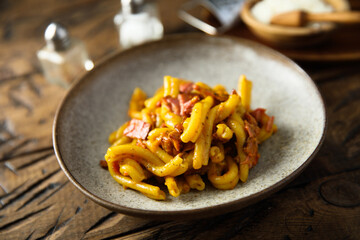 Pasta with pastrami and cheese