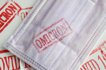 Protective mask with the inscription omicron, close-up