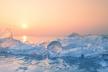 A clear ball of glass on the ice