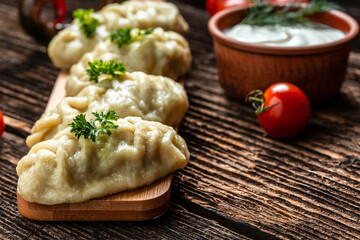 Traditional manti food on plate, top view. The concept of oriental cuisine. Uzbek food manty dumplings. Uzbek food. banner, catering menu recipe place for text