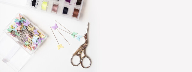 taking measurements on the fabric. Seamstress sewing on the sewing machine in small studio. Fashion atelier, tailoring, handmade clothes concept. Slow Fashion Conscious consumption.