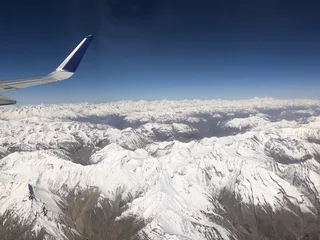 Papier Peint photo Himalaya Air Airlines and the bottom snow mountains view are Himalaya at Leh Ladakh India.