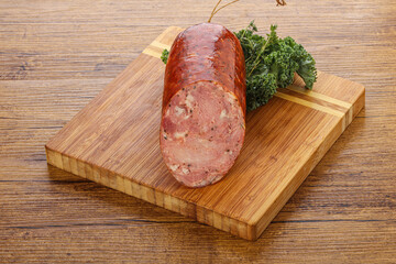 Pork ham sausage over board