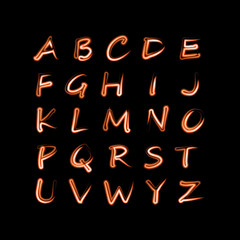 English alphabet orange with neon effect.