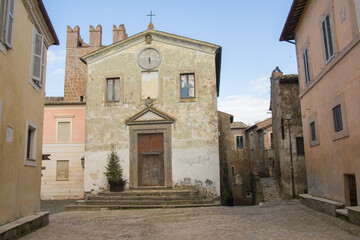Fototapeta na wymiar View of the old church in the medieval center of Calcata Vecchia village in Lazio