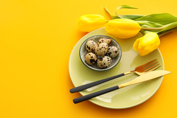 Beautiful table setting for Easter celebration and flowers on orange background, closeup