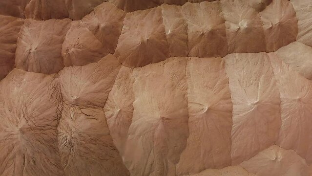 Aerial top-down view of potash hills of waste in Soligorsk, Belarus. Sand texture. Potash salt mining products. Potassium Fertilizers from Soligorsk, Belarus under sanctions.