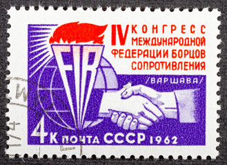 USSR - CIRCA 1962: A stamp printed in the USSR honoring IV Congress of the International Federation of fighters Resistance, Warsaw, circa 1962
