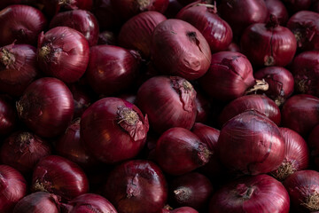 Ripe purple onion sold in the market