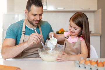 Cheerful Daughter And Dad Baking Cookies Together Making Dough Indoor