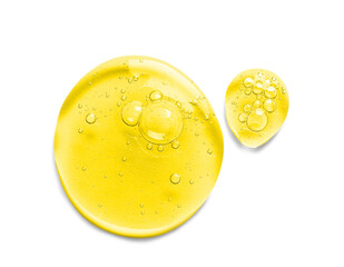 Drops of cosmetic serum on white background