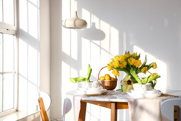 Table setting for Easter celebration in room