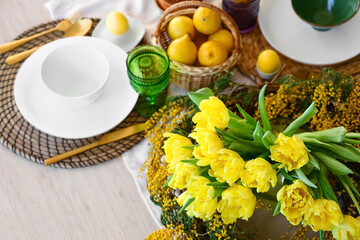 Beautiful flowers on dining table served for Easter celebration